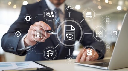 Fototapeta premium Businessman working on digital document management system, using a laptop and a pen to interact with a holographic interface showing various business process automation and document workflow icons.