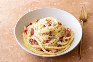 Pasta bucatini carbonara with cheese and pancetta. Italian food.