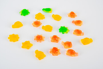 Assorted gummy candies, Juicy colorful jelly sweets. Gummy candies on white background