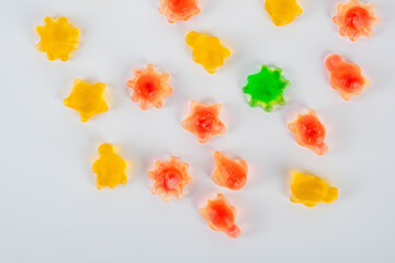Assorted gummy candies, Juicy colorful jelly sweets. Gummy candies on white background