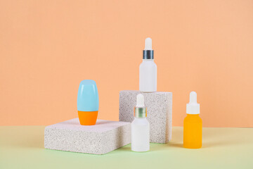 Plastic white tube for cream or lotion. Skin care or sunscreen cosmetic with stylish props and palm leaves shadow.