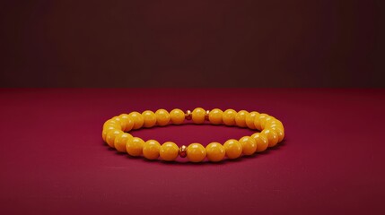 Elegant Minimalist 3D Rendering of Golden Prayer Bead Necklace on Rich Background