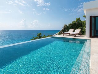 Obraz premium Luxurious rooftop pool with infinity edge, blending into the ocean view, clear blue water, simple sun loungers, bright sunny day