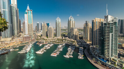 Fototapeta premium Aerial view timelapse of Dubai Marina at day time in Dubai, UAE