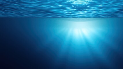 a blue ocean with sunlight shining through the water,