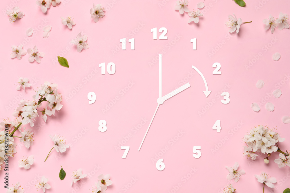 Poster clock and flowers on pink background, top view. arrow showing time change one hour ahead in spring. 