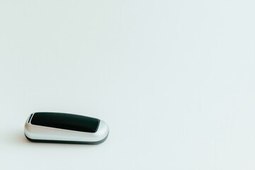 Sleek design of modern stapler placed on minimalistic background