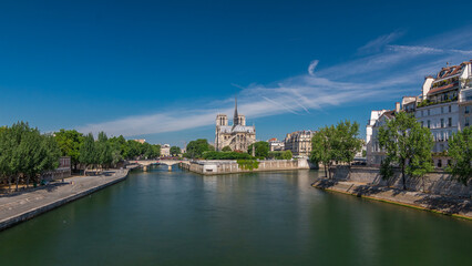 Obraz premium Seine and Notre Dame de Paris timelapse hyperlapse is the one of the most famous symbols of Paris