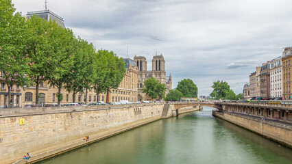 Notre Dame de Paris and Seine timelapse hyperlapse is the one of the most famous symbols of Paris