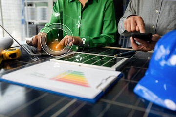 Two colleagues discussing data working green energy and solar panel concept.