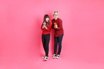 man and woman in red clothes