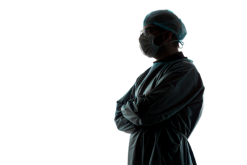 Surgeon in profile, arms crossed