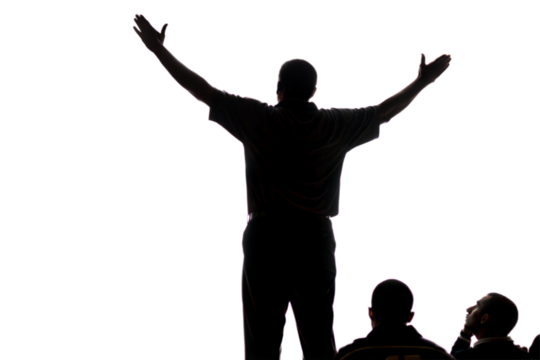 Silhouette of a speaker addressing an audience