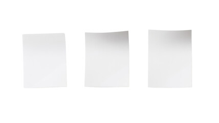 Three white pieces of paper with writing on them