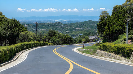 Fototapeta premium Winding road, mountain view, summer