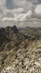 Hiking trail overlooking majestic mountain peaks in high tatras, slovakia