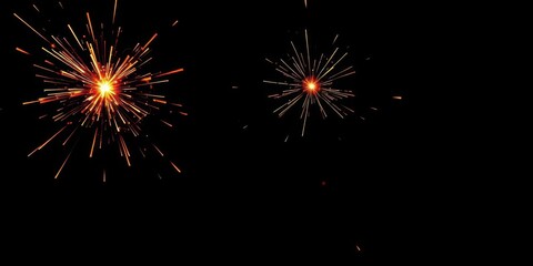Fototapeta premium Dynamic fiery sparks burst against a black backdrop, glow, flying sparks