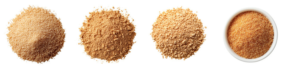 Close up view of an assortment of different spices and dried herbs including cinnamon ginger paprika and turmeric arranged in piles on a plain white background