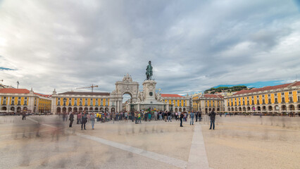 Triumphal arch at Rua Augusta and bronze statue of King Jose I at Commerce square timelapse...