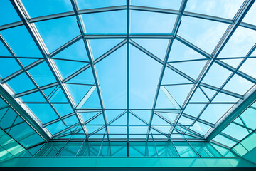 Modern glass roof structure with a geometric pattern, an architectural background