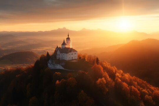 Majestic castle on a hilltop surrounded by autumn colors during a golden sunrise