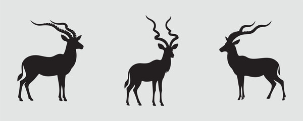 Set of three black silhouettes of antelopes with long, curved horns in different poses on a light background