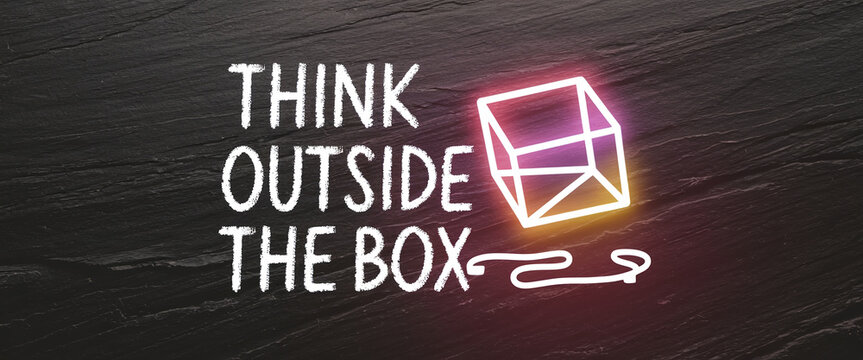 Black textured background with white chalk-style text "Think Outside the Box" and glowing neon cube, symbolizing creativity and innovative thinking