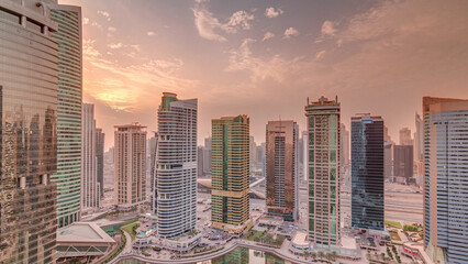 Obraz premium Residential and office buildings in Jumeirah lake towers district timelapse in Dubai