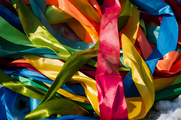 An enchanting array of multicolor ribbons, creatively twisted and arranged, creates a stunning...