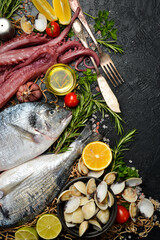 Fresh seafood, shellfish, crustaceans and fish. Background of marine food. Top view.