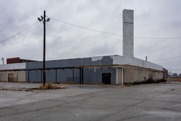 Brick shopping center left abandoned in East St. Louis on overcast day