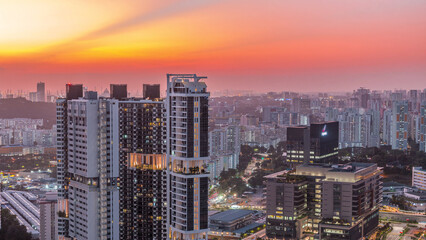 Aerial skyline with apartment buildings and skyscrapers of Singapore timelapse