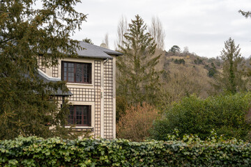 Exploring the serene architecture and natural beauty of La Roche-Guyon in the Pontoise district of France