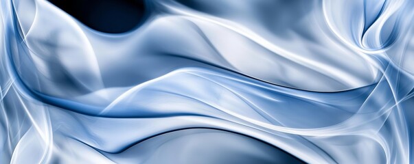 Obraz premium A dramatic shot of swirling deep sapphire blue and silver metallic smoke, creating an ethereal and mysterious atmosphere with fluid, dreamlike movement.