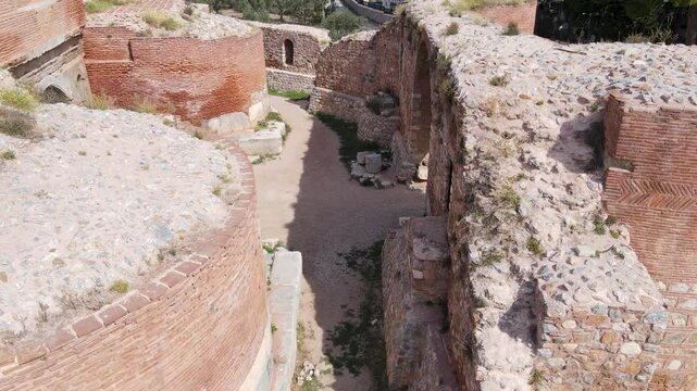 Footage of historical stone ruins, castles and city walls from the Roman period.