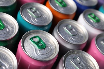 Many aluminium cans of beverage as background, closeup