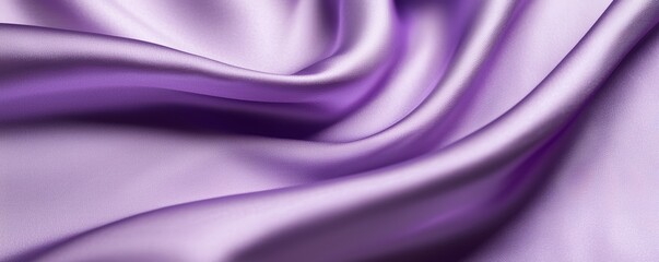 Obraz premium A rich lavender-hued silk fabric draped gracefully, its smooth, flowing folds catching light to create a dreamy and ethereal texture.
