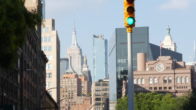 New York City street crossroad, yellow traffic light, transport road intersection, United States architecture. Empire State Building, american flag, Union Square. NYC Manhattan Midtown Bowery district
