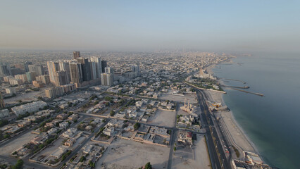 Cityscape of Ajman from rooftop during the morning after sunrise timelapse.