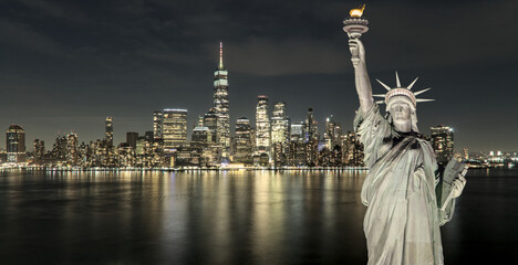 statue of liberty in front of new york city skyline composite photo (lady liberty freedom symbol sculpture built by french) nyc manhattan downtown cityscape © Yuriy T