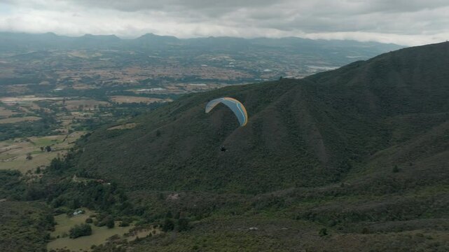 Paragliding hobby flying above the clouds enjoying leisure time couple gift experience extraordinary