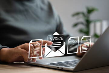 E-Invoice and Digital billing concept, Businessman using laptop to manage electronic statements on virtual screen. E-tax, Digital receipt, Online invoice processing and tax accounting solutions.