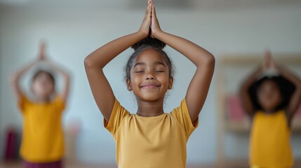 Inclusive classroom environment concept. A cheerful girl practices yoga with hands in prayer position, surrounded by peers, promoting mindfulness and wellness.
