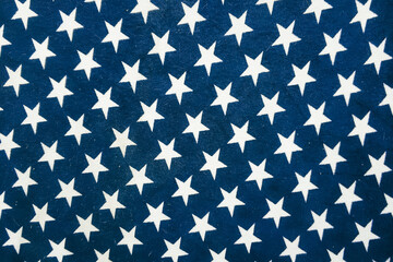 The design features white stars on a dark blue background, symbolizing patriotism, often used in...