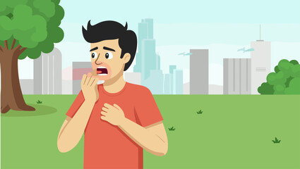 Young Man Suffering from Asthma Attack in Urban Park