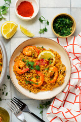 Traditional Spanish paella with seafood in a frying pan. .top view