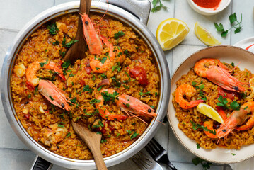 Traditional Spanish paella with seafood in a frying pan. .top view