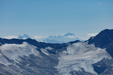 Naklejka premium View of stunning mountains and glacier landscape from Hintertux Glacier in Austria on a clear day, showcasing the beautiful natural scenery