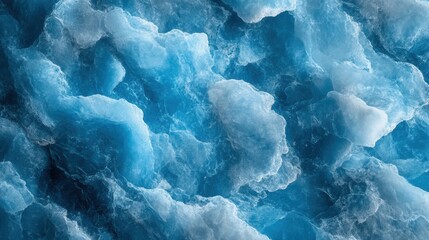 Obraz premium Close-up of vibrant blue ice formation with textured surface patterns