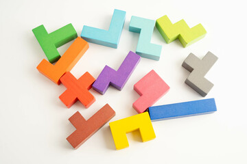Logical thinking and problem solving problem solution creative business, wooden puzzle geometric block shape.